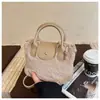 Bolso Peludo Portátil Transfronterizo para Mujer 2026 Nuevo Lindo de Peluche para Viajes Diarios Bolso Cubo Bajo el Brazo Bolso de Hombro Cruzado de Moda