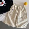 Calça Casual Infantil 2026 Outono Bordado de Desenho Calça Reta para Meninos Calça Longa Versátil Solta para Meninas