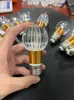 Lâmpada LED de baixo consumo, super brilhante, nova luz de luxo, iluminação LED para atacado, proteção para os olhos, lâmpada de acrílico com rosca.