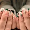 24 piezas de uñas postizas con temática navideña, con un diseño de copo de nieve francés verde, para una fácil aplicación y un look moderno, adecuadas tanto para el mercado europeo como para el americano