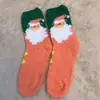 Calcetines de Navidad de coral de otoño e invierno, calcetines de suelo cálidos para el hogar de terciopelo medio, calcetines de Navidad de Papá Noel