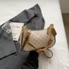 Bolsa de mão casual minimalista Shuai Mijia para mulheres, nova coleção outono 2026, bolsa de ombro estilosa com corrente, bolsa quadrada pequena casual e versátil para o dia a dia