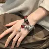 [Paz y Alegría] Nuevo Pulsera de Abalorios Ping An Kou Retro Chino Desgastado Exquisita Versátil Personalidad Estilo Tendencia China Pulsera