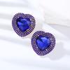 Pendientes exagerados europeos y americanos, pendientes de aleación con forma de corazón de diamantes transfronterizos, pendientes de cadena de garra elegantes con diamantes superbrillantes para mujer de moda.
