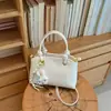 Bolso de mano estilo extranjero para mujer, nuevo bolso de hombro de moda 2026, versátil para el trabajo y los desplazamientos, bolso cruzado