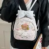 Linda bolsa de hombro estilo caricatura coreana de nuevo estilo para chicas, bolso cruzado lindo de otoño, mochila de doble hombro diaria 2026