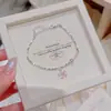 Pulseira de pérolas branco leitoso estilo suave, corrente de clavícula de luxo discreto e de alta qualidade, pulseira versátil doce e delicada para meninas