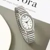 Relógio feminino de quartzo com formato oval, estilo moderno e casual, design de pulseira elástica, atacado direto de fabricante de exportação transfronteiriça