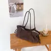 Nova bolsa tote de camurça de grande capacidade estilo coreano para o outono e inverno, bolsa de ombro/axila casual de moda de nicho com cordão