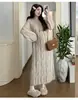 Moda Maternidade Coreana Outono e Inverno 2025 Novo Estilo Simples e Gentil Aconchegante Malha Alta Elasticidade Slim Comprimento Médio Saia-Suéter