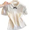 Top de punto trenzado color albaricoque con cuello de muñeca y manga corta para mujer, nuevo de verano 2026, ajuste ceñido, cintura estrecha, cuello vuelto, top corto