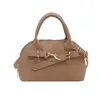 Bolsa Mini Pequena de Mão de Luxo Feminina 2025 Nova Bolsa Nicho Concha Moda Ombro Transversal Bolsa para Celular