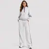 Conjunto esportivo casual popular transfronteiriço europeu e americano para mulheres, com moletom com zíper e gola semi-alta e calça longa larga solta, conjunto de duas peças