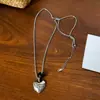 Collar de Corazón de Metal y Piedra Natural para Mujer 2026 Nuevo Estilo Cadena para Clavícula Tacto de Alta Gama Colgante Largo Cadena para Suéter Accesorios