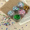 Pó glitter floco de neve a laser de Natal transfronteiriço 4mm areia líquida lantejou enchimento de presente de feriado peças de glitter de vários formatos