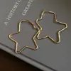 Pendientes Exagerados de Estrella Hueca 2026 Nuevos Pendientes Populares Dorados Aros Únicos y Hermosos Pendientes de Alta Gama para Mujer