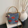 Bolso de Mano de Oficina Transfronterizo de Nicho Súper Popular para Mujer Modelo Nuevo 2026 Bolso Cruzado Tipo Cubo Exquisito y Elegante