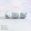 Cuentas de cabeza de gato de cerámica lindas y frescas, cuentas sueltas con agujeros rectos, cuentas de pulsera de animales de color sólido, materiales para manualidades, cerámica de Jingdezhen