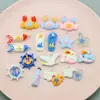 Accesorios DIY serie estilo océano resina cangrejo pantuflas delfín hueso de pez ancla botella a la deriva colgante