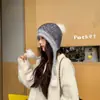Novo chapéu Lei Feng quente para outono e inverno, que afina o rosto, chapéu de tricô com proteção para as orelhas de pelúcia, com um estilo sofisticado e fofo