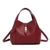 Bolsa de mão com padrão de lichia, design de nicho coreano, pequena bolsa tote, elegante e versátil, adequada para o trabalho, bolsa feminina, transfronteiriça