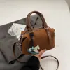 2025 Nuevo Bolso Almohada Retro Bolso de Mano Popular para Mujer Textura Bolso Boston Bolso Cruzado Casual de Este Año
