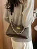 Bolso de hombro cruzado acolchado con cadena estilo Chanel para mujer, moda coreana de nicho, bolso de hombro y bandolera simple