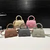 Bolso Pequeño Cuadrado Mini Portátil de Alta Calidad para Mujer 2024 Nuevo Bolso de Hombro de Moda Bolso Transmisor de Comercio Exterior Transfronterizo