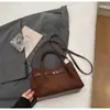 Bolso de mano vintage de ante transfronterizo para mujer, nuevo bolso tipo cubo de alta moda de tendencia, bolso de hombro y cruzado de gran capacidad