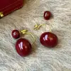 Pendientes de bola redonda roja Ankora, Lujo ligero, Pendientes exquisitos y de alta gama, Pendientes de nicho modernos y elegantes para mujer