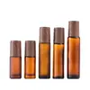 Botella de Vidrio Roll-On de 5 ml, Botella de Vidrio para Aceite Esencial Esmerilada de 10 ml con Tapa de Madera, Botella de Muestra Negra con Soporte de Perlas y Bola de Acero de Vidrio