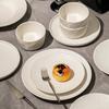 Mesa de Hotel Tigela Pratos e Prato Branco Puro Conjunto Doméstico Cor de Esmalte Inferior de Alta Temperatura Cerâmica Louça Leve Luxo Sensação de Alto Padrão Pratos e Prato