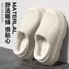Bolsa impermeable y pantuflas de algodón para hombre y mujer 2026 estilo nuevo a prueba de olores con soporte para el arco talón cálido zapatos de felpa de algodón para parejas