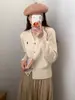 Suéter de punto cuello en V bordado cárdigan de punto chaqueta de punto trenzado para mujer capa exterior top holgado sentido del diseño suéter de punto al por mayor