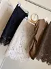 Falda midi de terciopelo hueca de encaje vintage estilo francés para mujer, nueva de principios de otoño, de cintura alta, adelgazante, elegante, ajustada al cuerpo