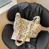 Bolsa de poá de nicho super popular para mulheres, nova bolsa transversal versátil da moda 2026, bolsa de ombro/axila requintada, bolsa de chifre