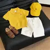 Estilo Coreano 2026 Verão Novo Conjunto Casual Infantil de Polo Bordado Amarelo Tricotado de Manga Curta com Shorts