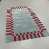 Alfombra de sala de estar de alta gama, de color contrastante, con un patrón geométrico simple, adecuada para villas, clubes y dormitorios; una alfombra de área grande