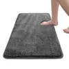 Suministro exclusivo transfronterizo de alfombrillas de baño de felpa de pelo largo altamente absorbentes, alfombrillas antideslizantes para inodoro, alfombrillas para pies de dormitorio y alfombrillas resistentes a la suciedad para puerta de entrada