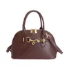 Bolso de Mano Retro de Concha de Gama Alta para Mujer 2026 Nuevo Nicho Versátil para el Trabajo y el Viaje al Trabajo Bolso Tote Pequeño de Hombro Cruzado