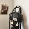 Bolso Cruzado Versátil para el Día a Día Verano 2026 Diseño Único de Nicho Bolso de Mano Casual Estilo Vaquero Bolso de Bowling