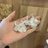 Brincos de concha de flor para mulheres, nova coleção 2026, design de alta qualidade, leves e elegantes, brincos únicos inspirados em pérolas