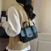 Bolso cuadrado pequeño casual y simple 2026 nuevo color de moda bloques de color gran capacidad bandolera para el hombro bolso de mano para mujer
