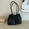 Bolsa Feminina de Ombro Único Nova Coleção Primavera/Verão 2026 Textura Trançada Temperamento Simples Bolsa de Axila Bolsa Tote de Alta Qualidade para o Trabalho