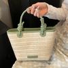 Bolso Tejido de Paja Popular de Moda para Mujer 2026 Nuevo Modelo Celebridad de Internet Elegante Bolso Cubo Tejido Bolso Cruzado Pequeño de Playa