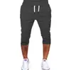 Comercio exterior popular europeo y americano casual deportivo corte ajustado color liso cinco puntos pantalones de chándal para hombre con cordones
