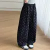 Pantalones deportivos de otoño para niños transfronterizos 2026 otoño nuevo pantalones de chándal de lunares de celebridad de Internet para niños medianos y grandes pantalones largos casuales