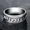 [Pequeño al por mayor] Venta caliente transfronteriza anillo de cadena giratorio con relieve de acero inoxidable anillo de acero de titanio simple y a la moda