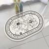 Estilo Pastoral Blanco y Negro Boceto Flor Ovalada Alfombrilla de Baño Lujo Ligero Balcón Dormitorio Imitación Cachemir Felpudo Stock Al Por Mayor