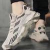 Zapatos para hombre 2025 nuevos de suela blanda cómodos para correr zapatos casuales tejidos con mosca zapatillas para hombre fabricantes de zapatos casuales venta al por mayor